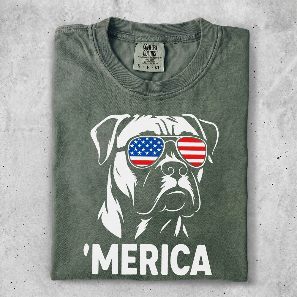 Boxer dog wearing American flag sunglasses, with "MERICA" text.