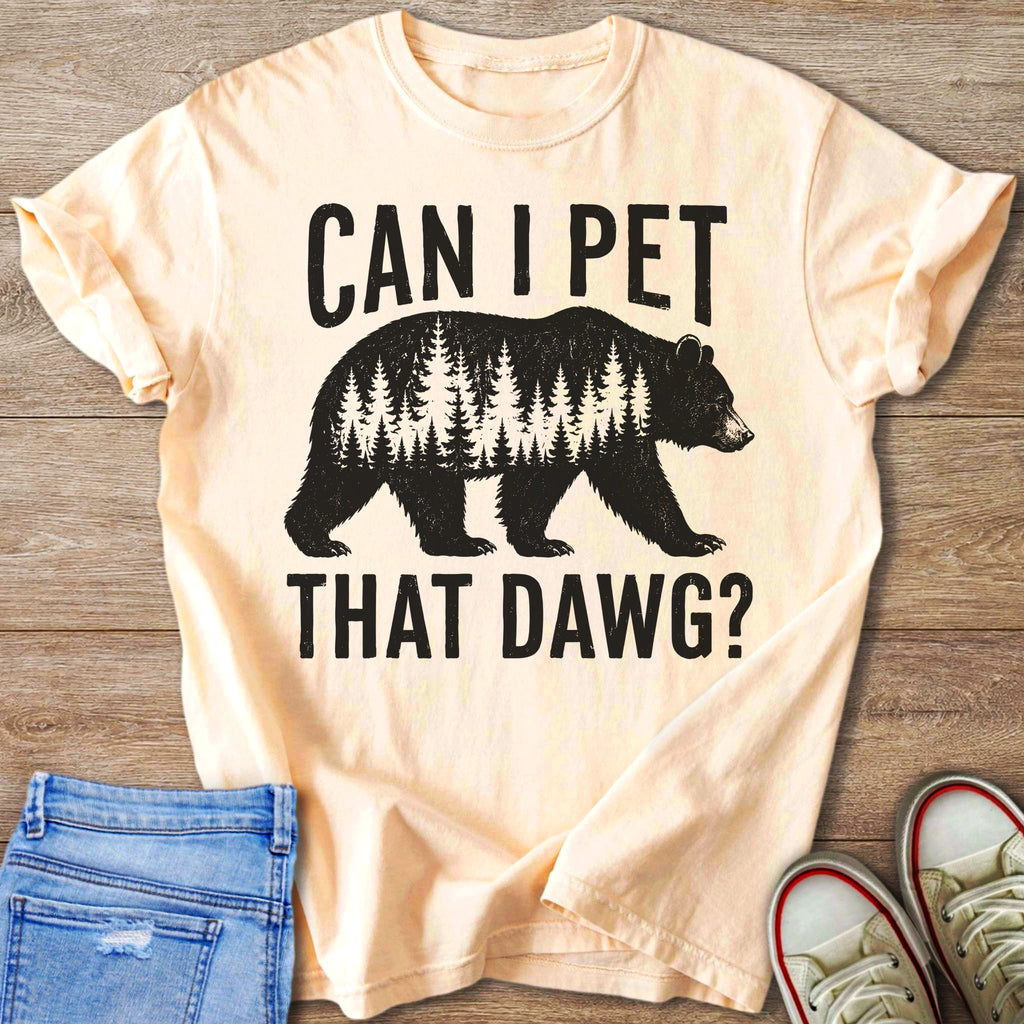 Peach t-shirt with black graphic of a bear with trees and text CAN I PET THAT DAWG?
