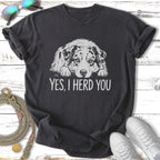 Dark t-shirt with a relaxed Australian Shepherd dog graphic and text "YES, I HERD YOU".