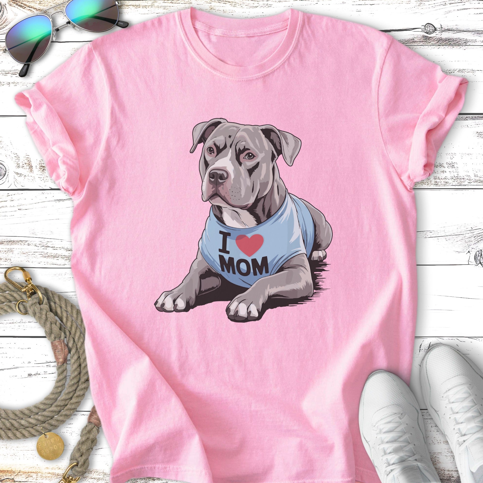 Pink t-shirt with illustration of a pit bull wearing an "I love Mom" shirt.