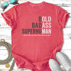 Coral t-shirt with "BOLD BADASS SUPERHUMAN" and dog text.