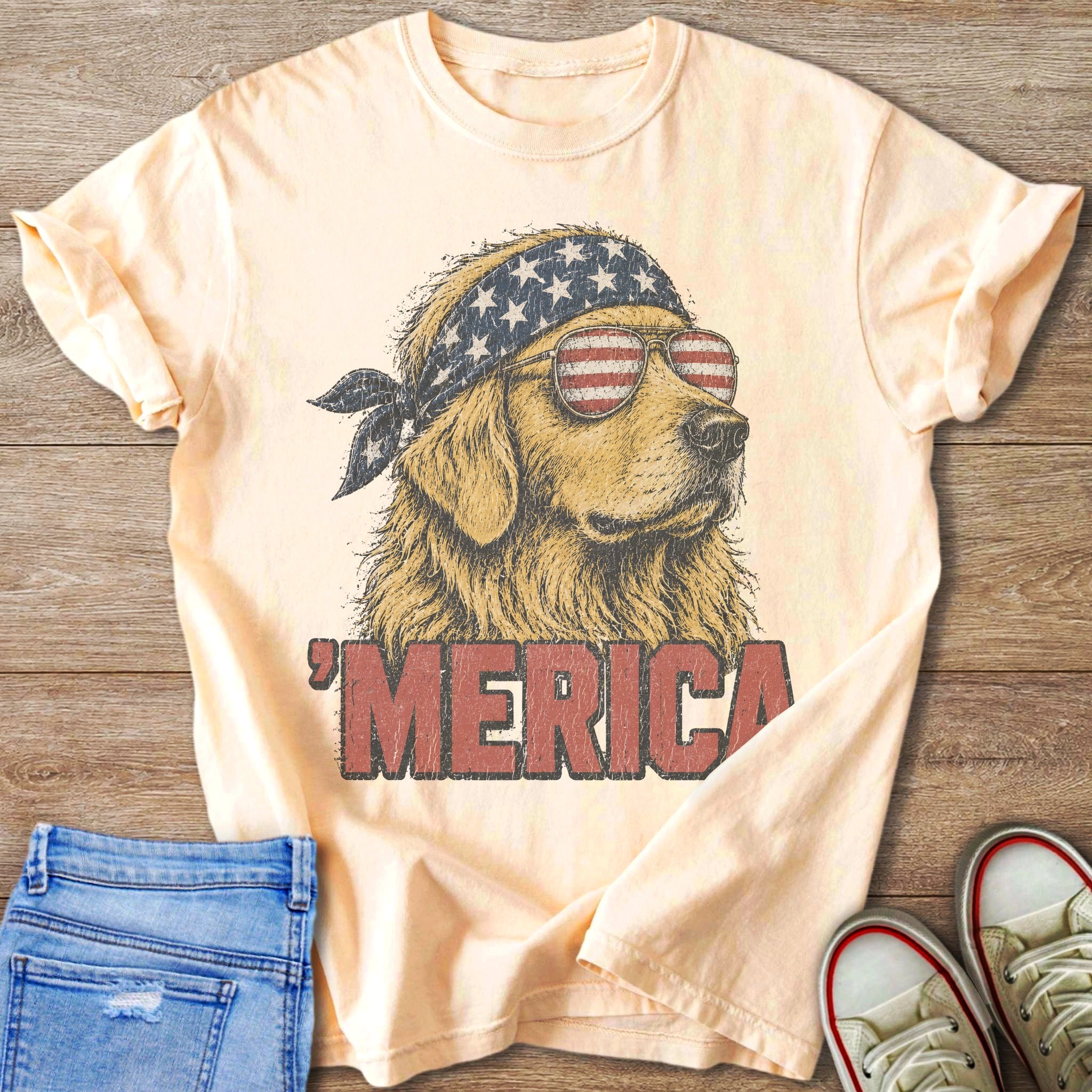 Golden retriever wearing American flag bandana and sunglasses, with text "'MERICA".