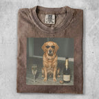 Golden retriever in sunglasses with champagne and glass.