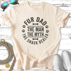Cream t-shirt with black text "Fur Dad The Man The Myth The Snack Dealer".