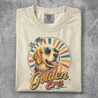 Cream t-shirt featuring a golden retriever wearing sunglasses with "Golden Era" text.
