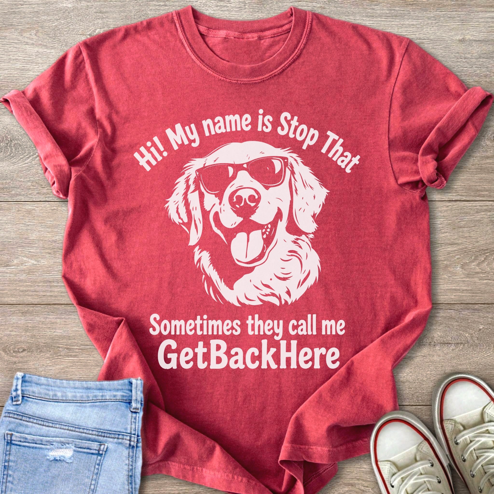 Red t-shirt with white graphic of a dog wearing sunglasses and text.