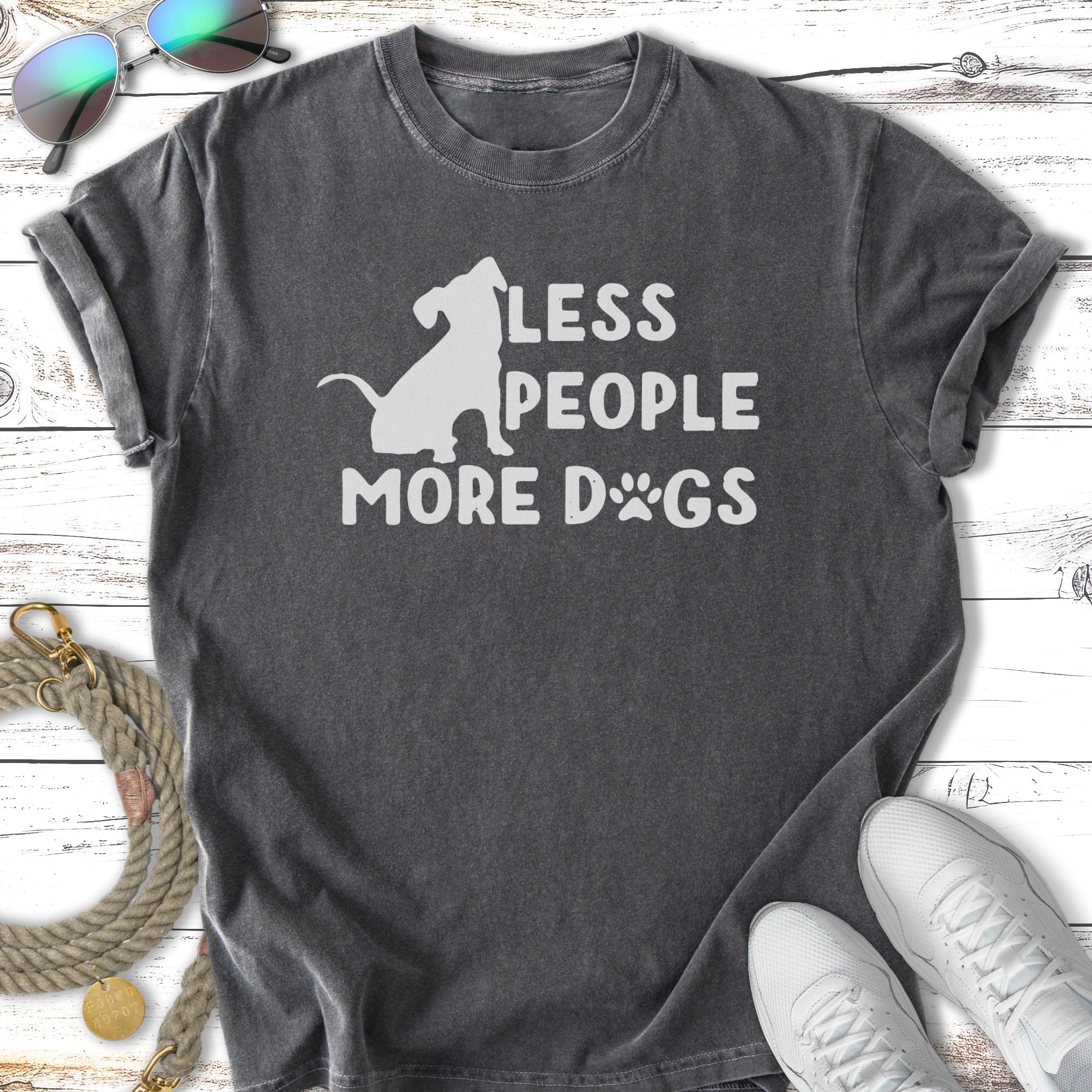Distressed charcoal t-shirt with white text and dog silhouette: "LESS PEOPLE MORE DOGS".