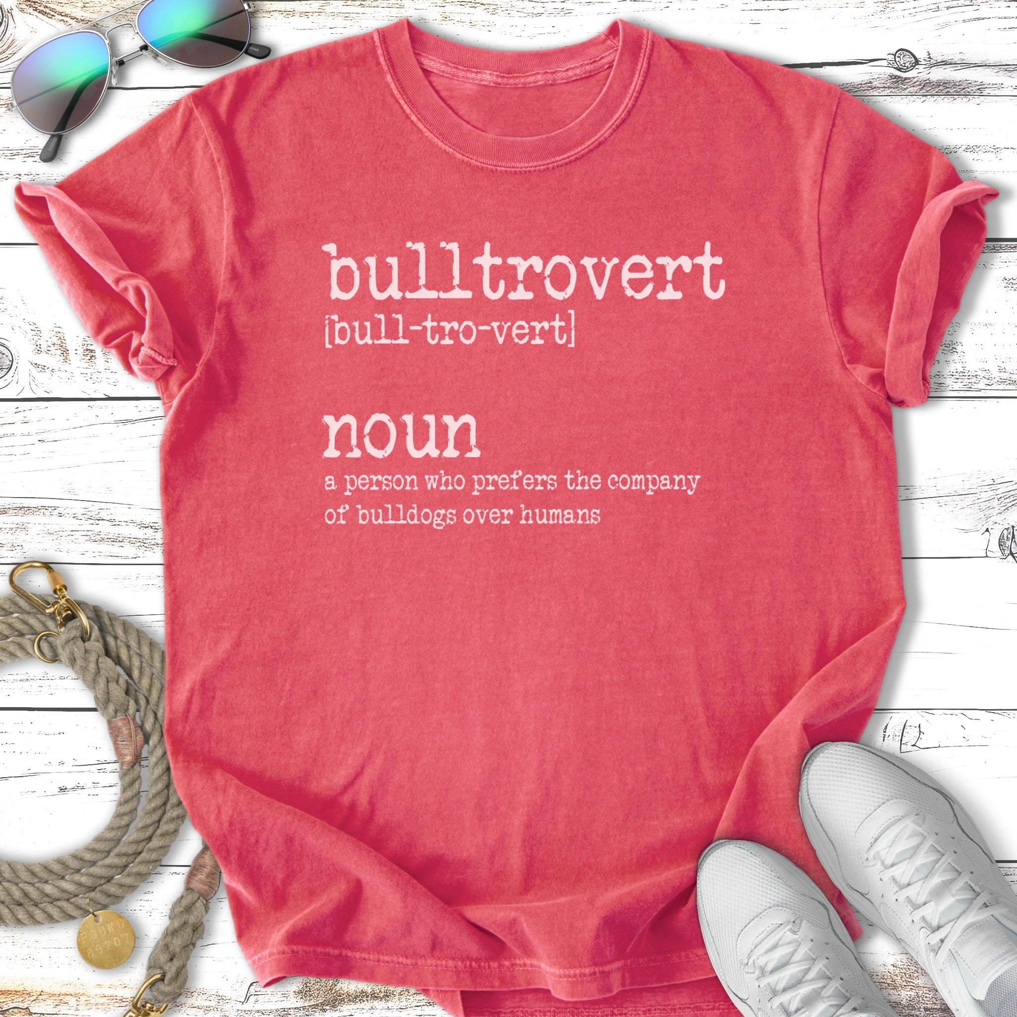 Red t-shirt with "bulltrovert" definition printed in white text.