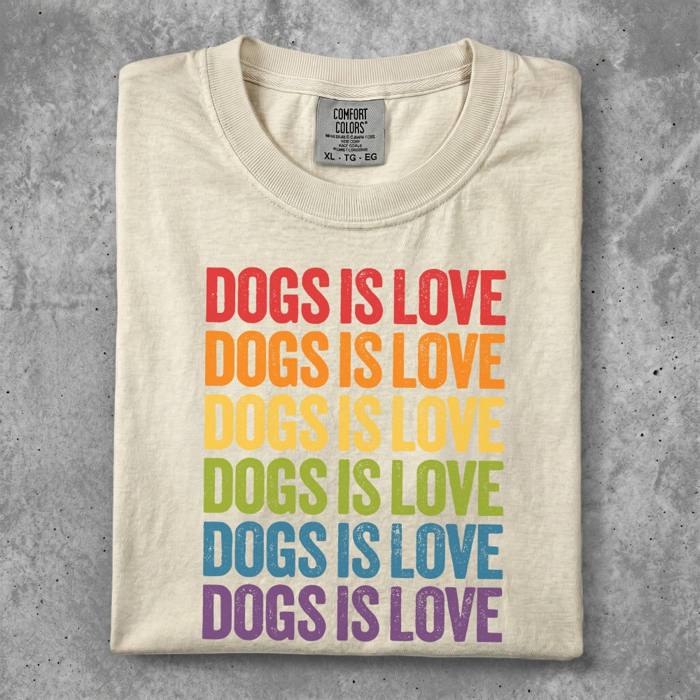 Cream t-shirt with "Dogs is Love" repeated in rainbow colors.