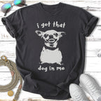 Dark t-shirt with a distressed white graphic of a dog's face and text "i got that dog in me".