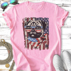 Pink t-shirt with a pug wearing American flag sunglasses and bandana.