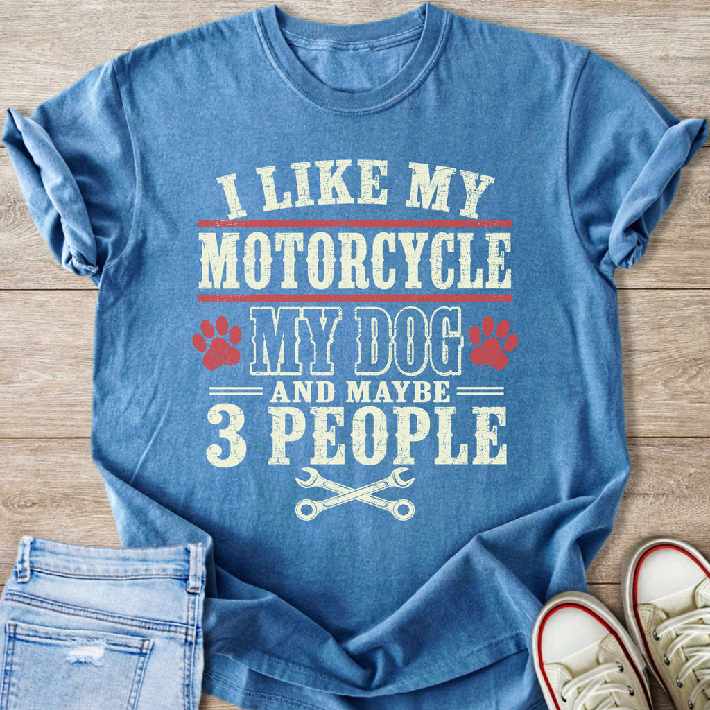 Blue t-shirt with text: "I like my motorcycle, my dog, and maybe 3 people."