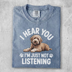 Blue t-shirt with a dog and text: "I hear you, I'm just not listening."