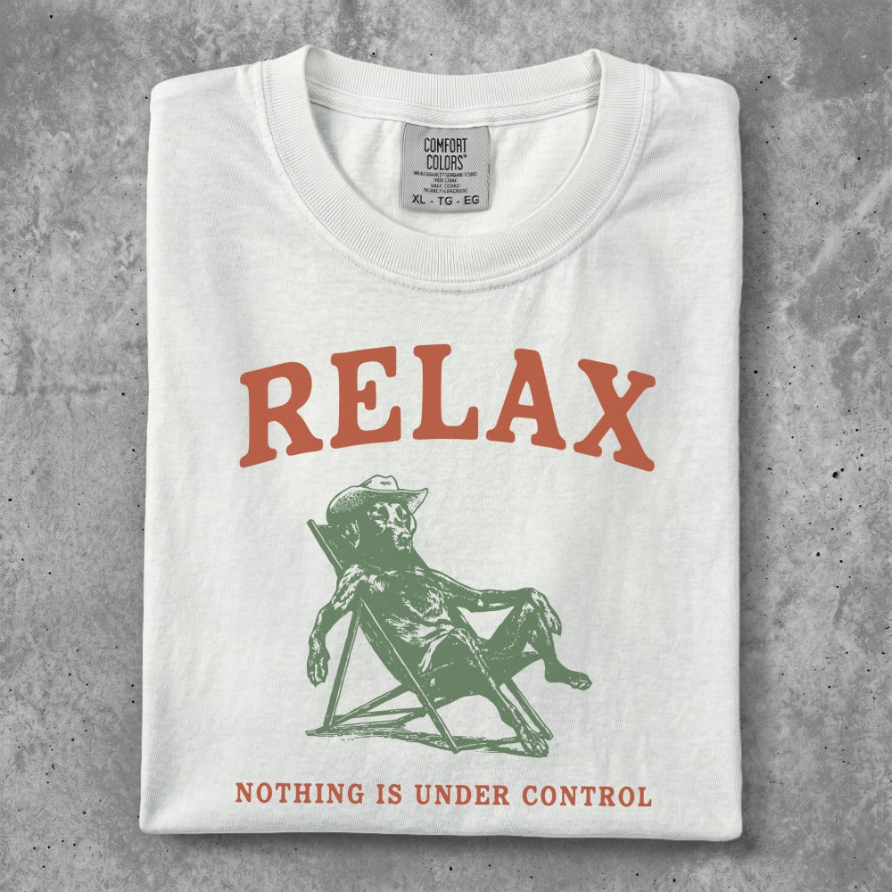 White t-shirt with "RELAX" and man in chair graphic.