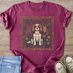Burgundy t-shirt with Cavalier King Charles Spaniel in floral frame on wood background