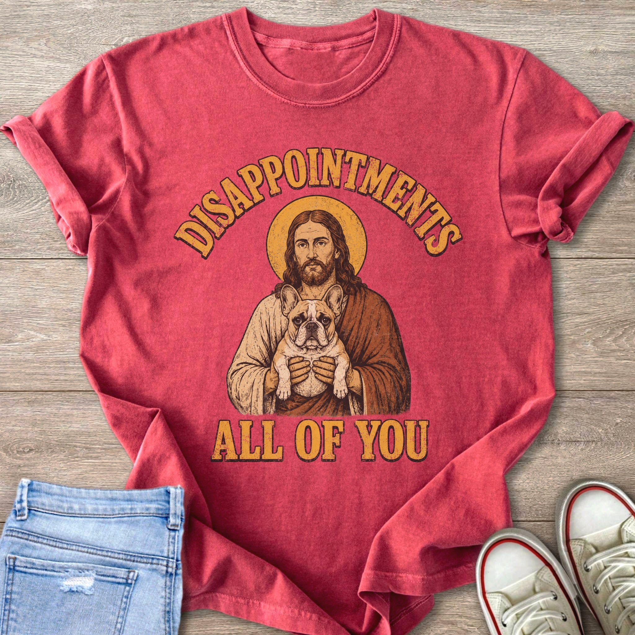 Jesus holding a French bulldog with text "Disappointments All of You".