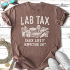 T-shirt with "Lab Tax Snack Safety Inspection Unit" and illustrations of snacks.