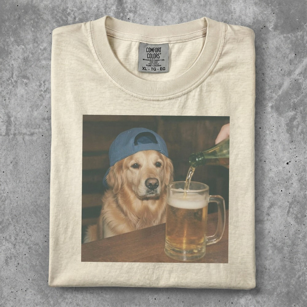 Golden retriever wearing a blue hat, looking at a beer being poured.