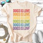 Cream t-shirt with rainbow text "DOGS IS LOVE" repeated.