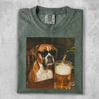 Boxer dog wearing sunglasses, with beer being poured into a mug.