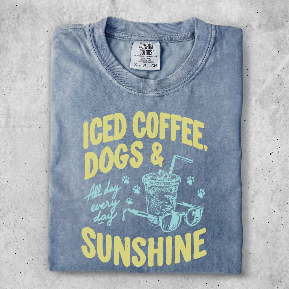 Blue t-shirt with "Iced Coffee, Dogs & Sunshine" graphic.