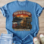 "Proud Member of Too Old to Care Boomer Club" t-shirt with a dog.