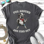 Pug in cowboy hat and bandana holding a gun, "Pug Around and Find Out."