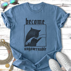 T-shirt with black cat biting finger and "become ungovernable" text.