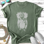 Green t-shirt with distressed kitten graphic, white sneakers, sunglasses, and rope.