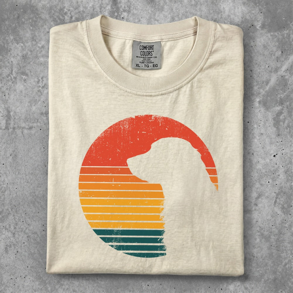 Cream t-shirt with vintage sunset dog silhouette graphic and Comfort Colors tag.