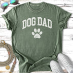 Green t-shirt with "DOG DAD" and a paw print graphic.