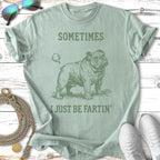 Green t-shirt with a bulldog illustration and the text "SOMETIMES I JUST BE FARTIN'".