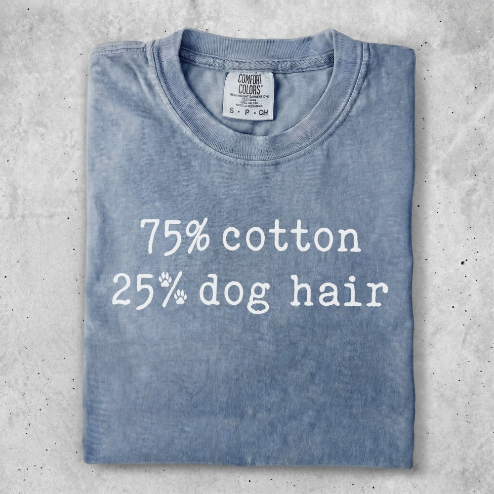 Blue t-shirt with "75% cotton 25% dog hair" text.