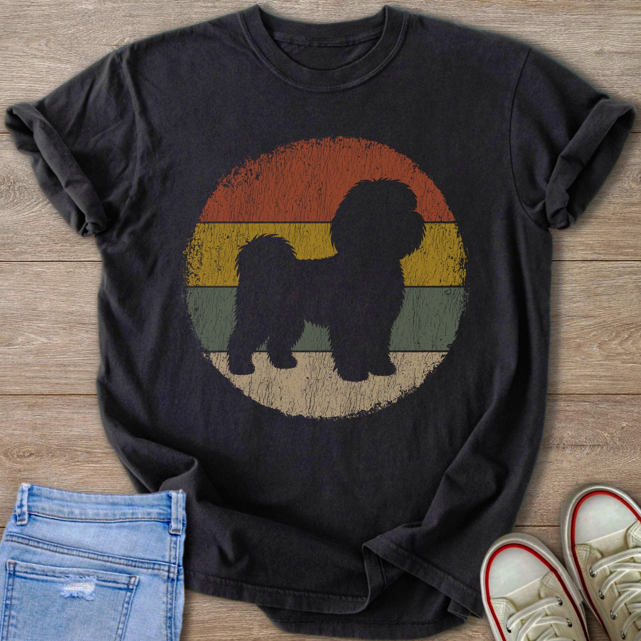 Black Shih Tzu silhouette on distressed vintage sunset design on t-shirt.