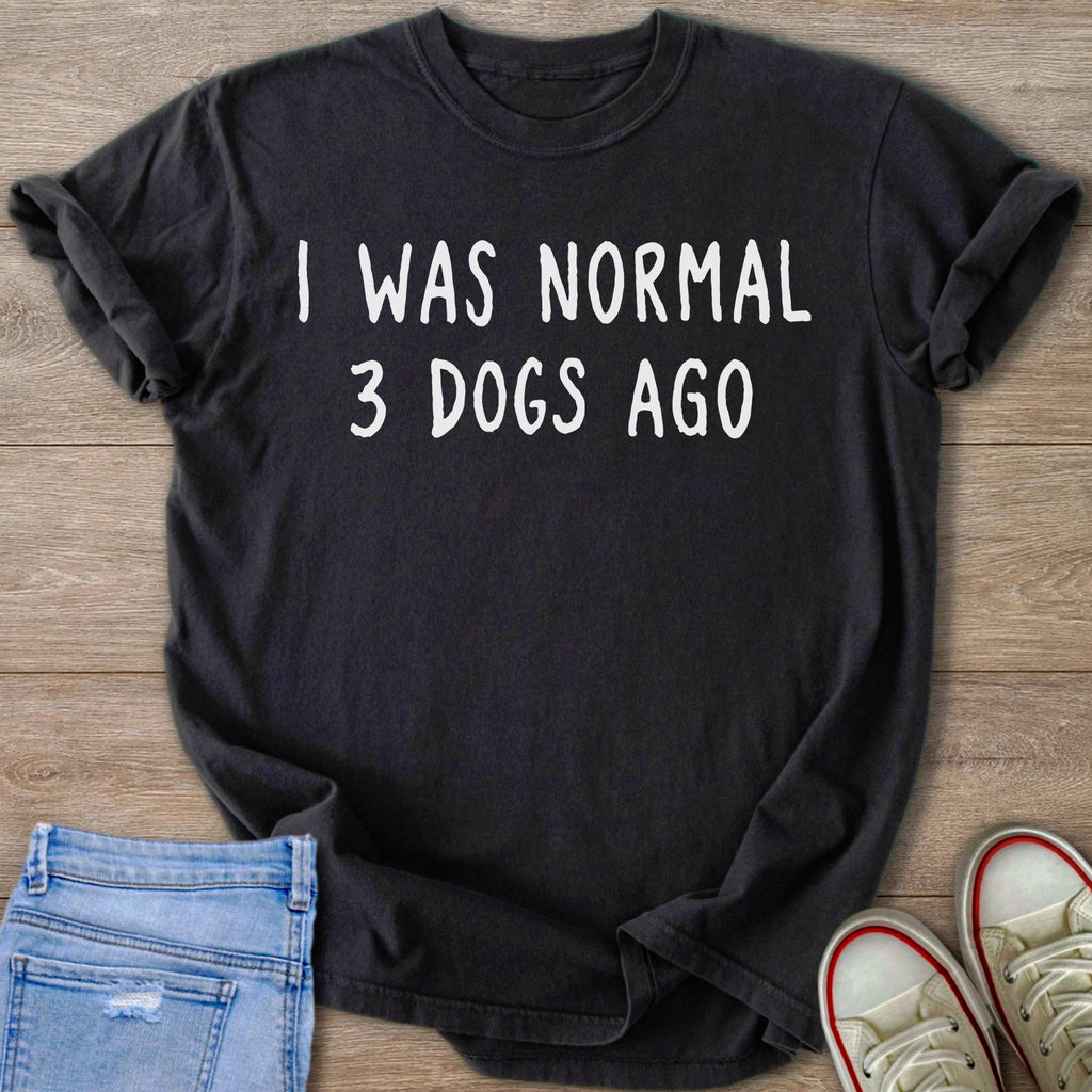 Dark t-shirt with white text "I WAS NORMAL 3 DOGS AGO".