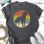 Black dog silhouette within a vintage-style sunset graphic on a charcoal t-shirt.