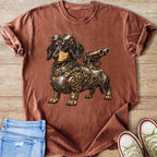 Steampunk dachshund wearing goggles, armor, and telescope on a rust-colored t-shirt.