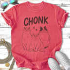 T-shirt with "CHONK" text and illustration of three chunky cats.