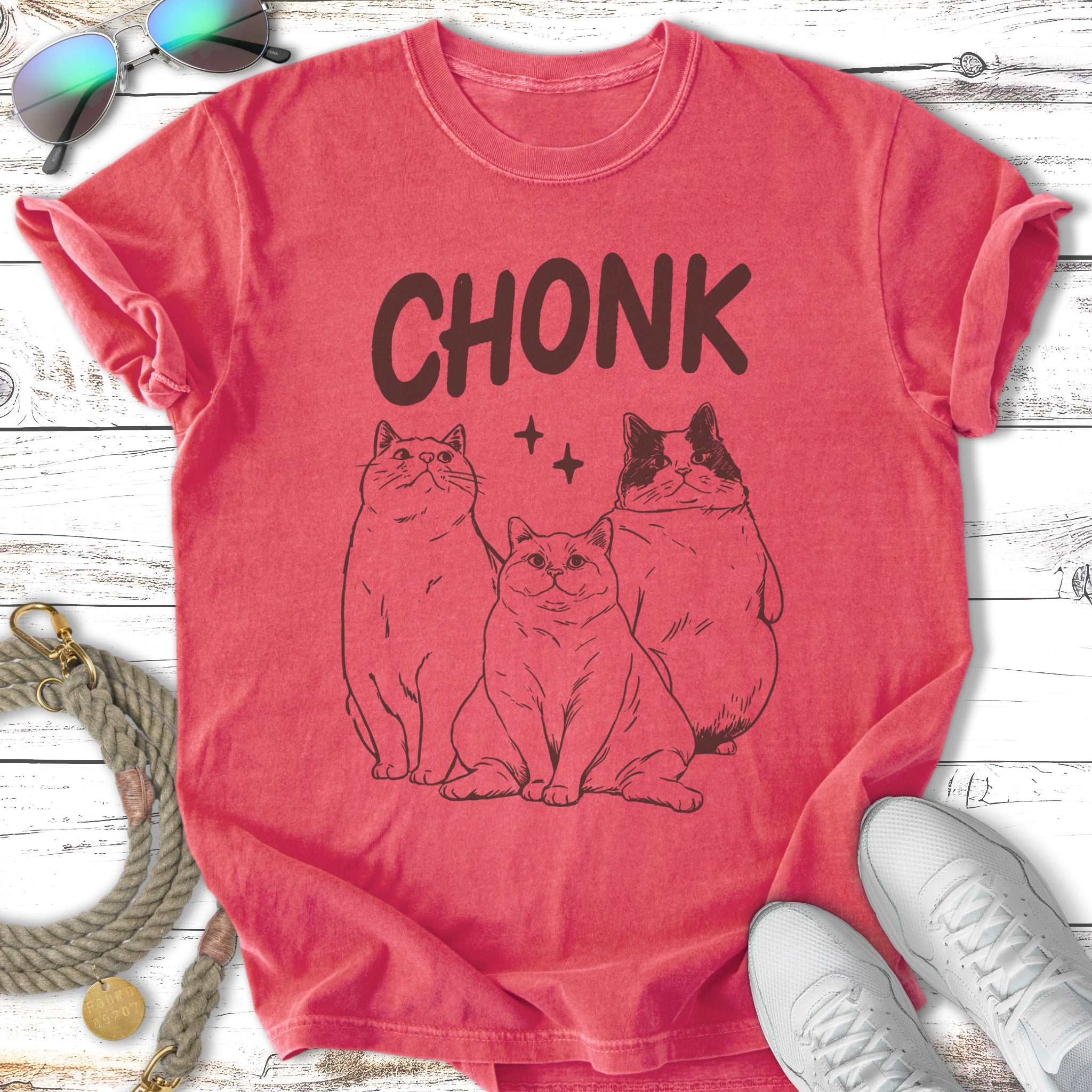T-shirt with "CHONK" text and illustration of three chunky cats.