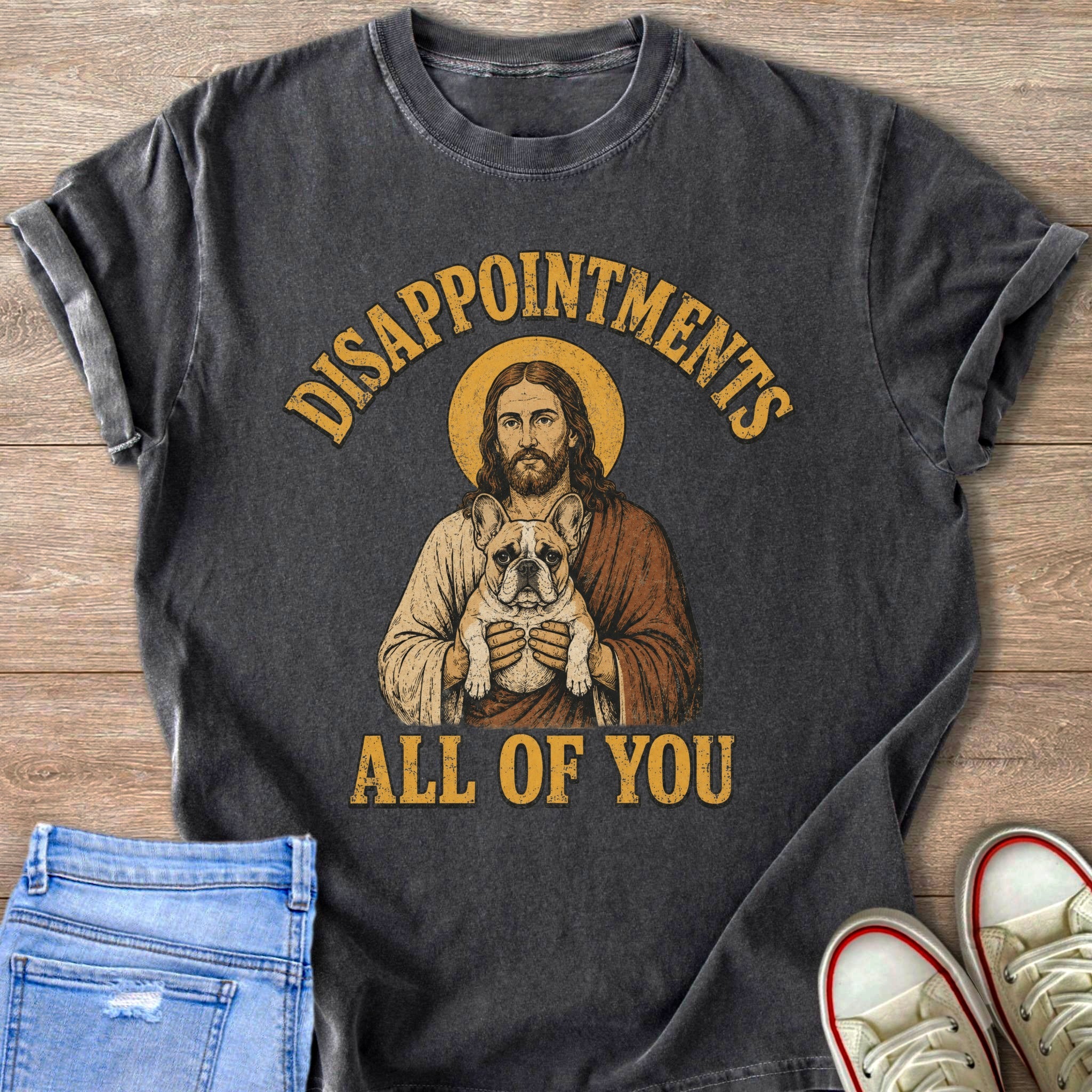 Jesus holding a French bulldog with text "Disappointments All of You".