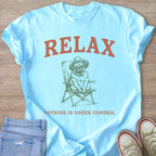 Light blue t-shirt with "RELAX" and dog sitting in a chair.