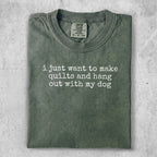 Green t-shirt with text: "i just want to make quilts and hang out with my dog".