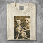 Two dogs, one Dalmatian and one Golden Retriever, getting tattoos.