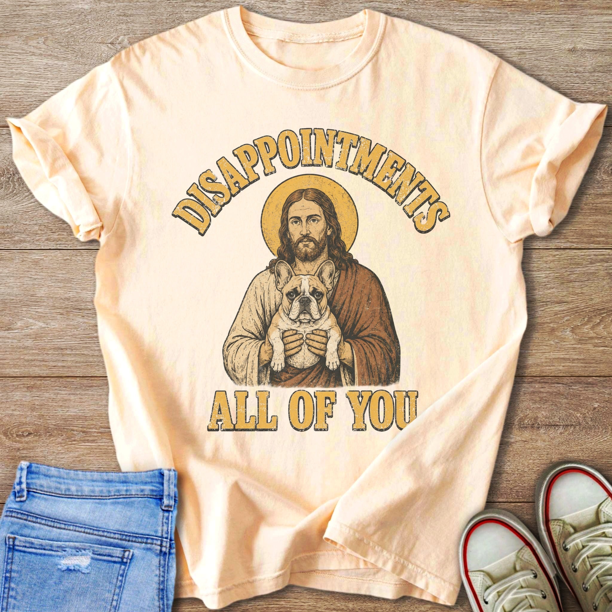 Jesus holding a French bulldog, with text "Disappointments All of You".