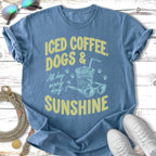 T-shirt with "ICED COFFEE, DOGS & SUNSHINE" text and paw prints.