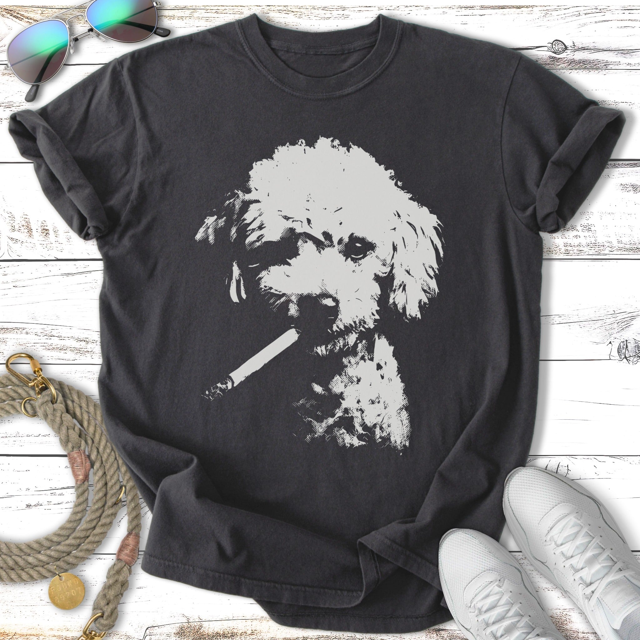 Dark t-shirt with a stylized white poodle wearing sunglasses and holding a cigarette.