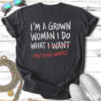 Dark t-shirt with "I'M A GROWN WOMAN I DO WHAT I WANT MY DOG WANTS" text.