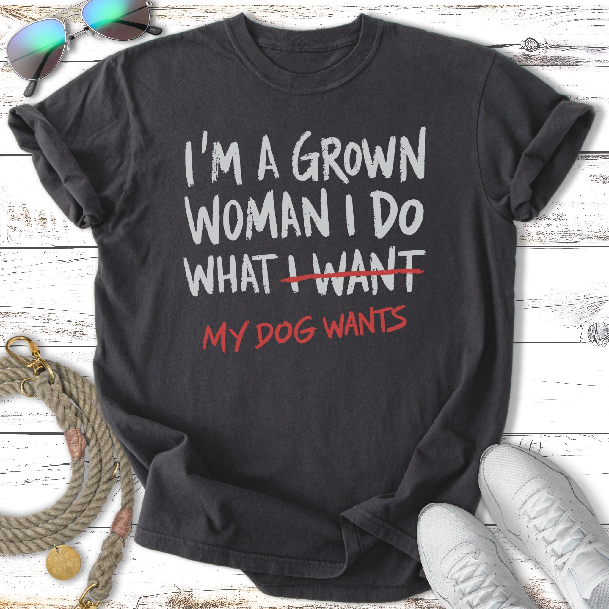 Dark t-shirt with "I'M A GROWN WOMAN I DO WHAT I WANT MY DOG WANTS" text.