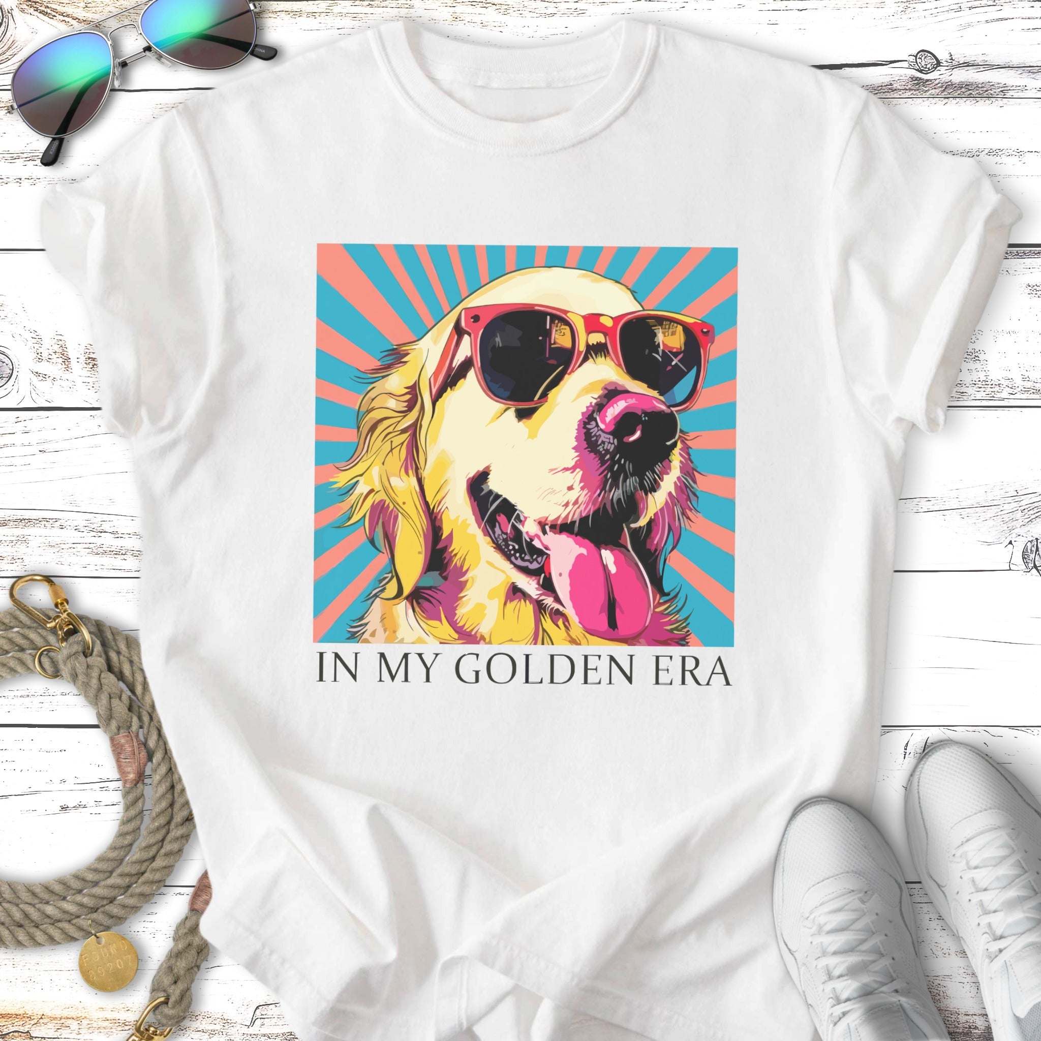 Golden retriever wearing sunglasses with tongue out, "In My Golden Era" text.