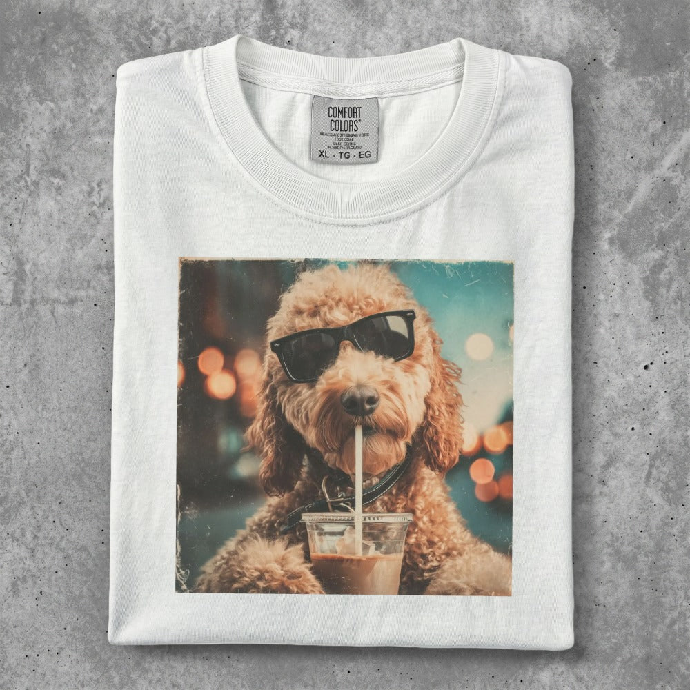 White t-shirt with a graphic of a dog wearing sunglasses holding a coffee.